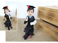 Figurka DZIECKO STUDENT siedzący 13 cm mix